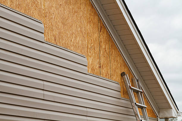 Professional Siding Replacement technician working in Norwich, CT